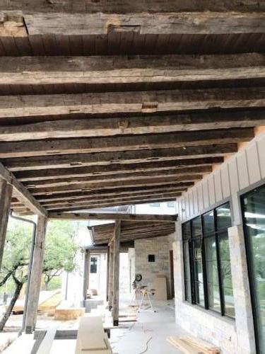 Reclaimed-Hand-Hewn-Hardwood roof beams!